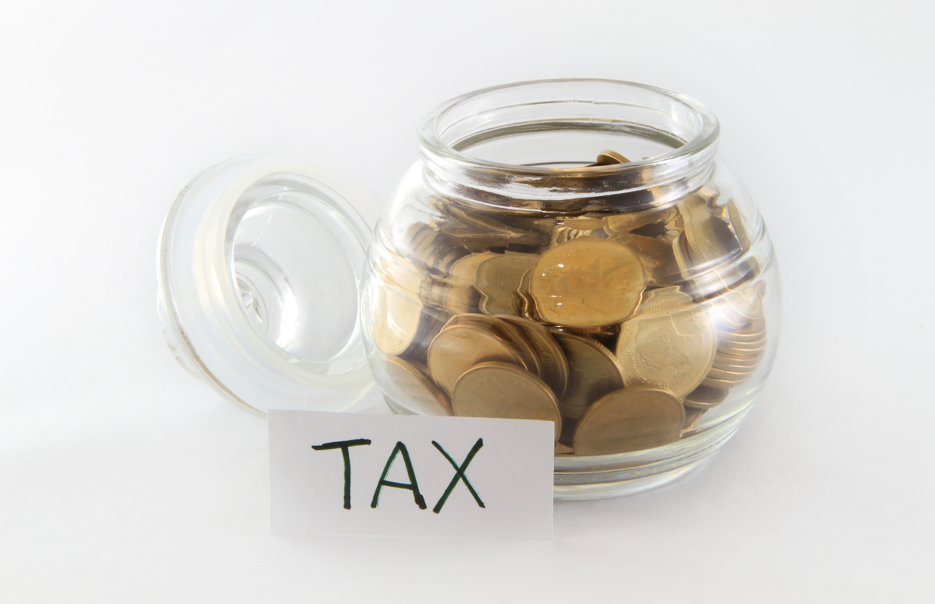 Glass bank for tips with money isolated on white